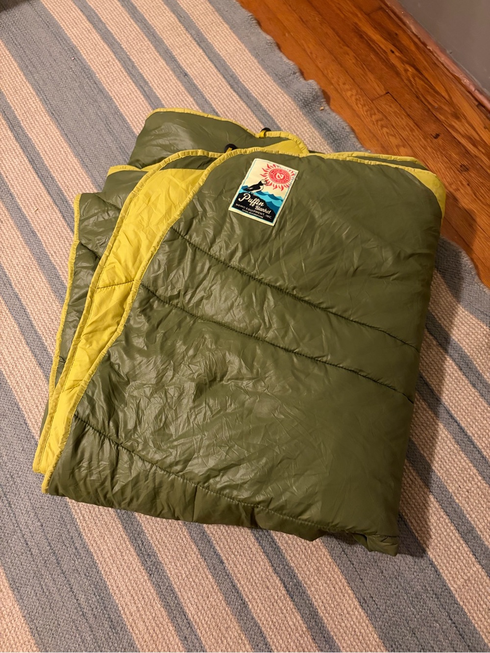 Nemo Equipment Puffin Blanket in Olive and Lime Reversible Quilted camping